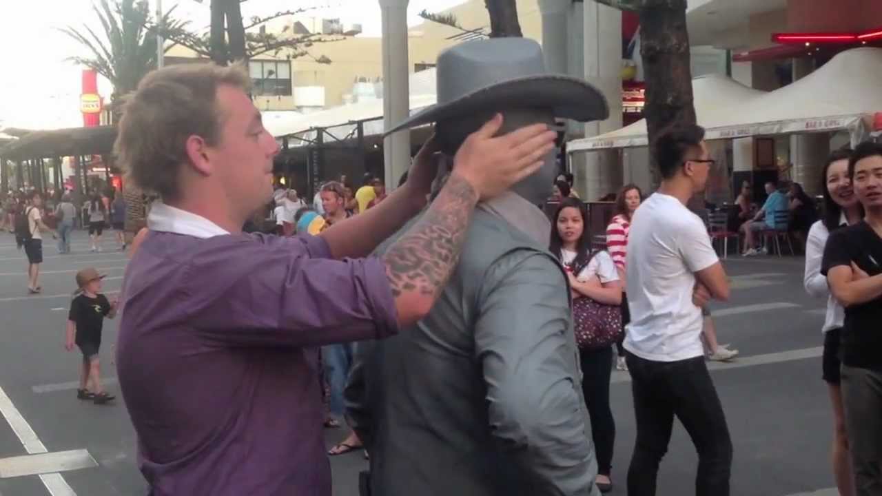 Guy gets punched by street performer! (Original)