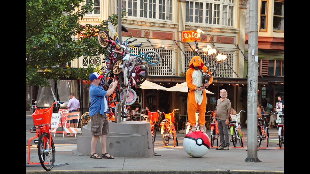 Charmander Plays Pokémon Theme on Flaming Bagpipes while Balancing on a Pokéball in Portland