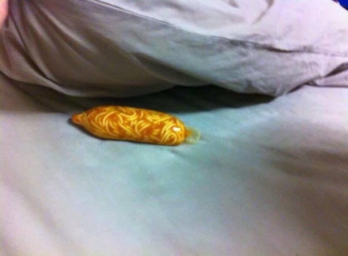condom with spaghetti in it, spaghetti filled condom