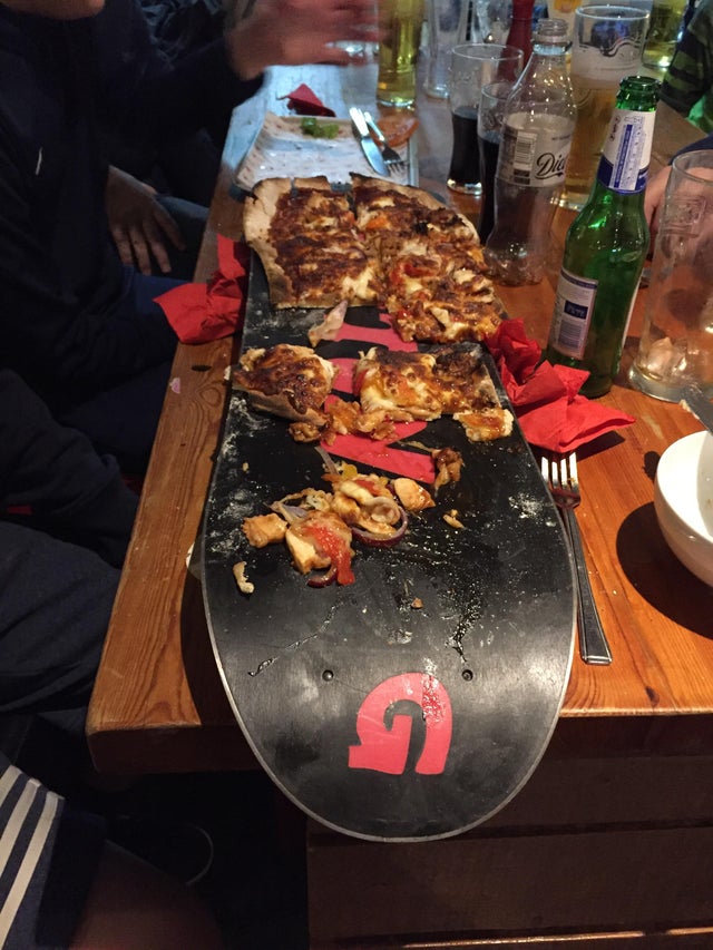 We Want Plates - pizza on snowboard