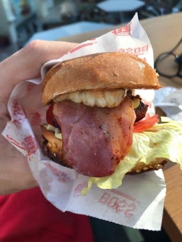 sandwich that looks like a animal mouth, sandwich looks like animal tongue, sandwich looks like animal mouth, cursed sandwich, cursed sandwich image, cursed sandwich, cursed sandwich picture, cringey food, cringe food, cursed food, cursed food image, funny cursed image, cursed image