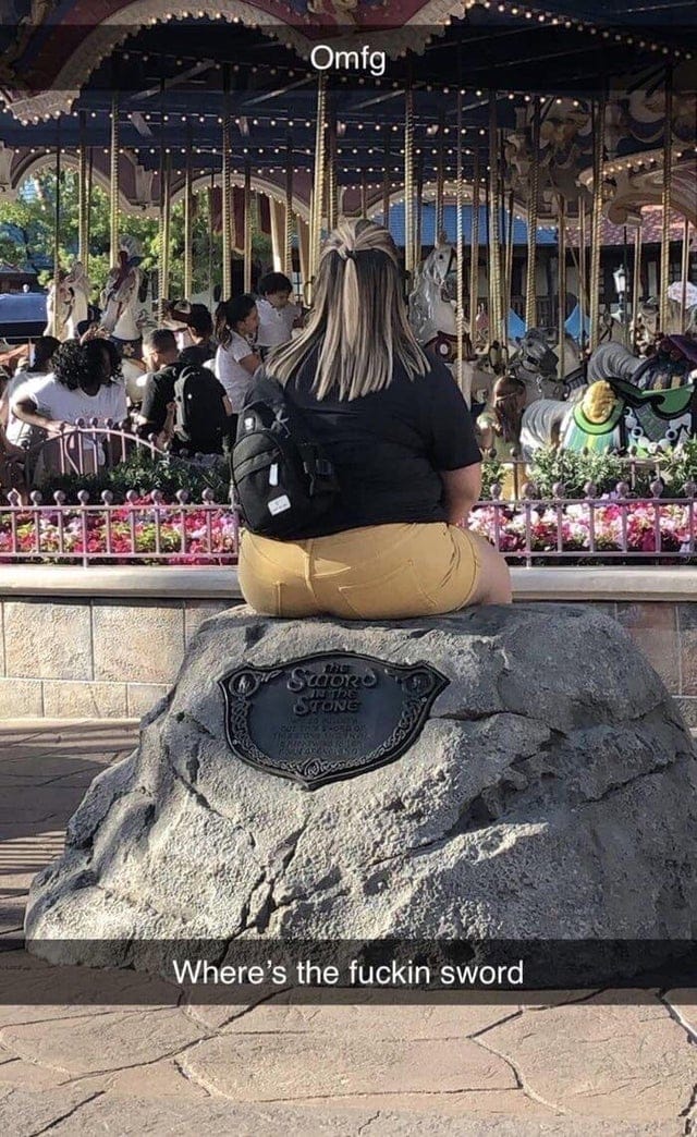 woman sitting on sword in the stone