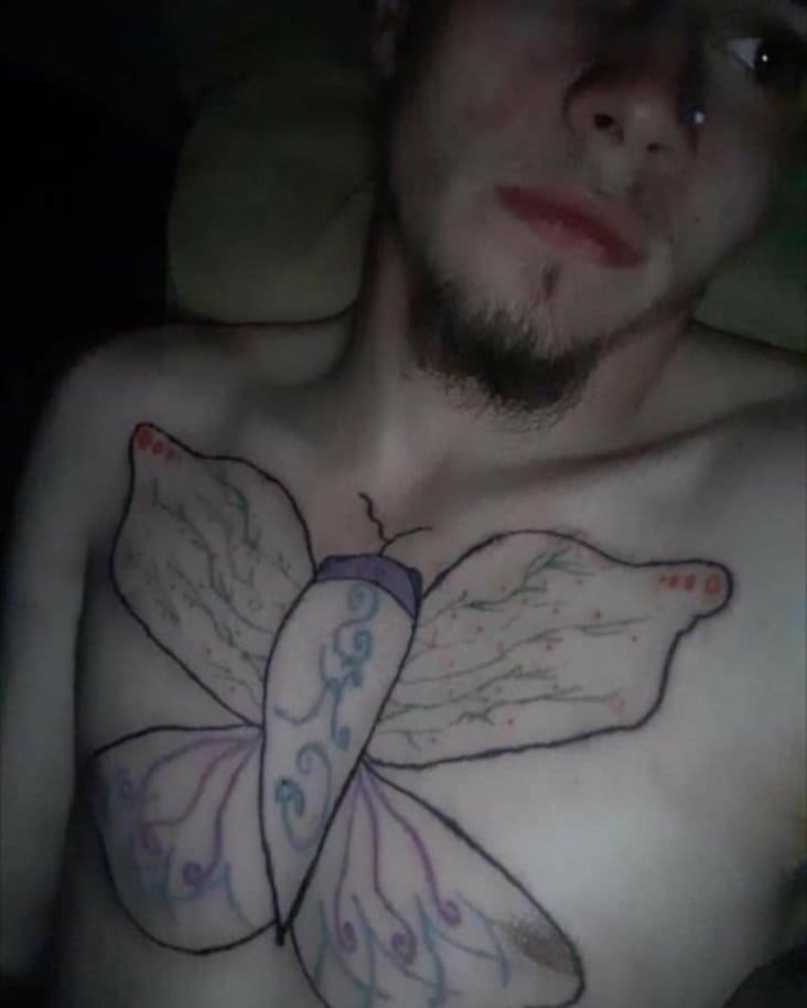 not super great chest tattoo, butterfly chest tattoo