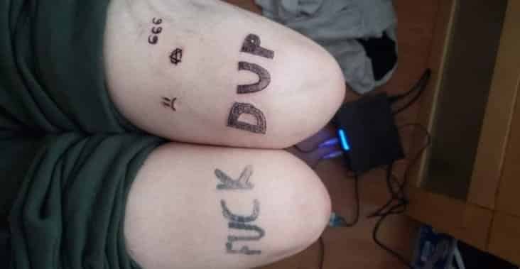 fuck dup tattoo, fuck dup knee tattoo, fuck dup thigh tattoo