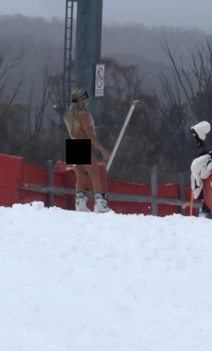 what appears to be woman not wearing much in snow influencer in the wild