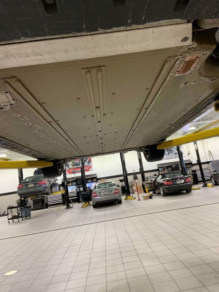 undercarriage of tesla just rolled into the shop