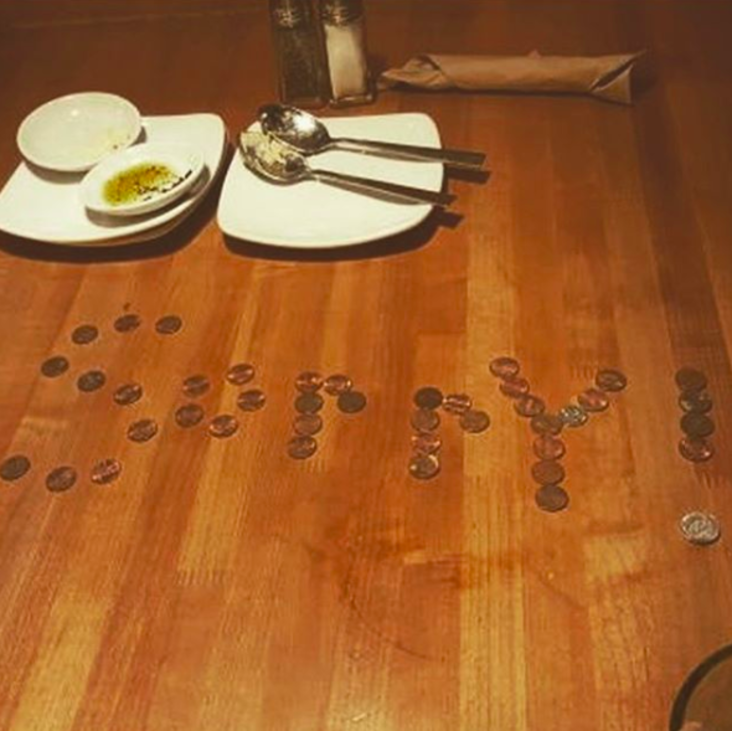 Spelled "sorry" in pennies for tip