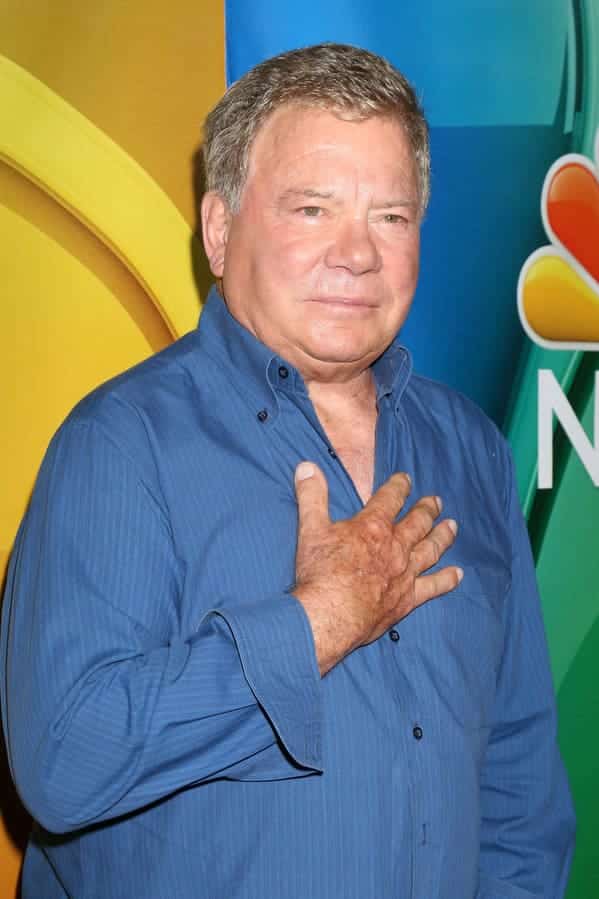 william shatner holding his hand over his heart, Worst songs to listen to during sex, worst sex songs playlist, Spotify funny playlist, worst sex songs, funny songs to make love to, songs that are not sexy, pleated jeans Spotify