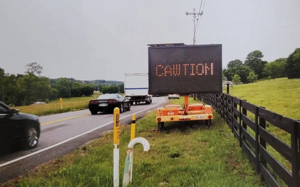 not my job - cawtion road sign