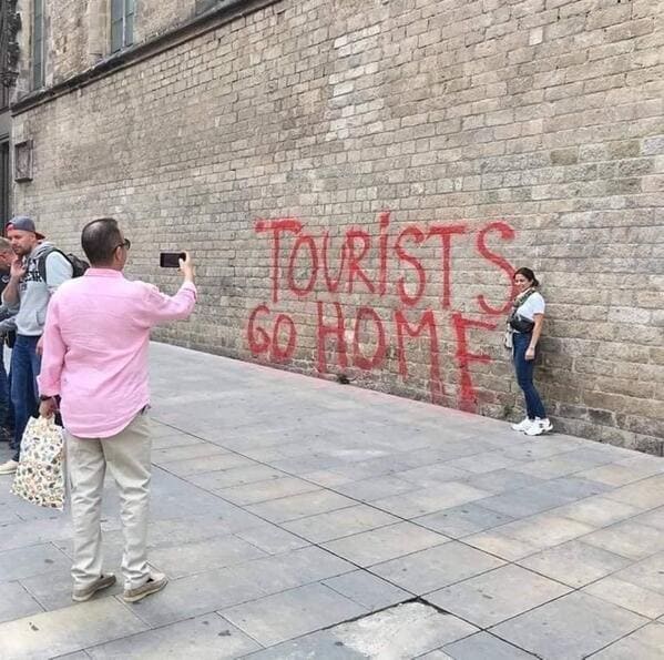 there was an attempt - tourists go home grafitti