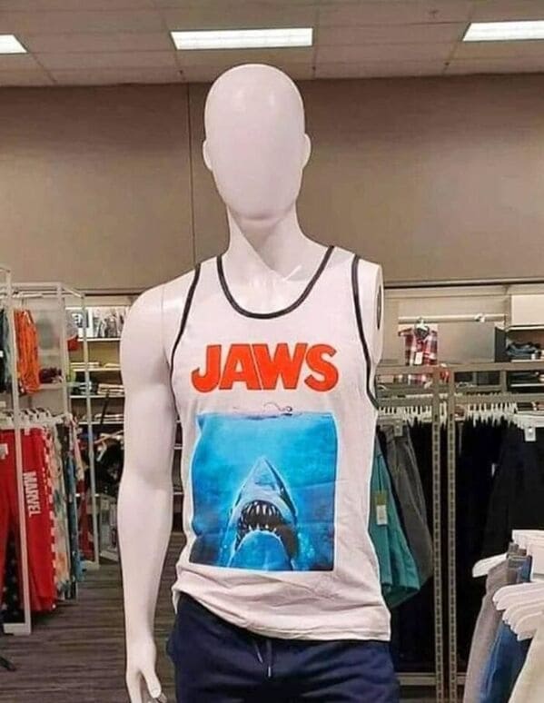 accidental surrealism - jaws tank top on one-armed mannequin