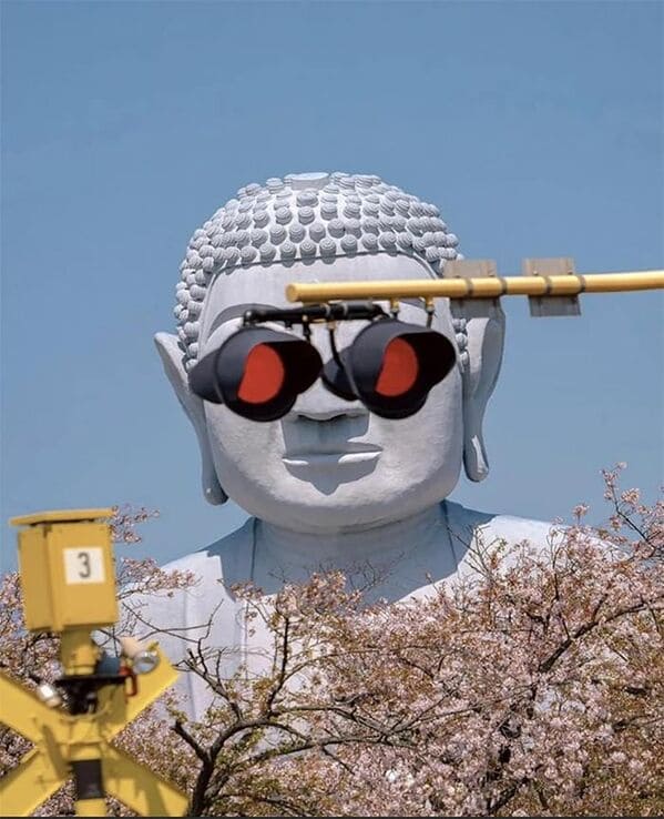 accidental surrealism - traffic lights blocking the eyes of a statue