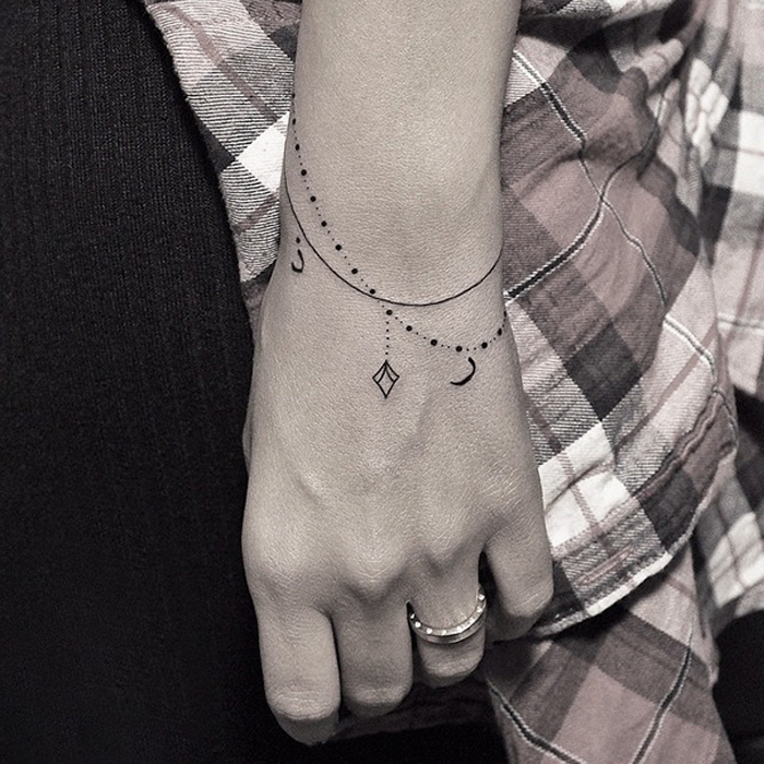 cool first tattoo ideas - minimalist bracelet