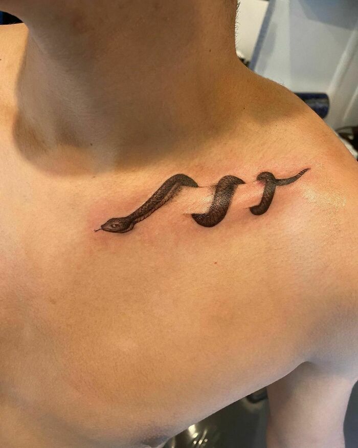 cool first tattoo ideas - collar bone snake