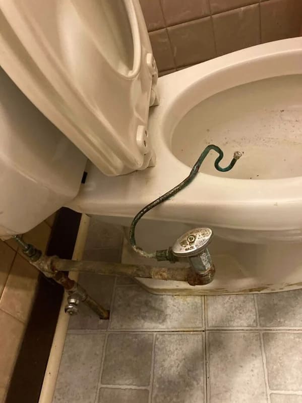 plumbing fails - toilet with pipes