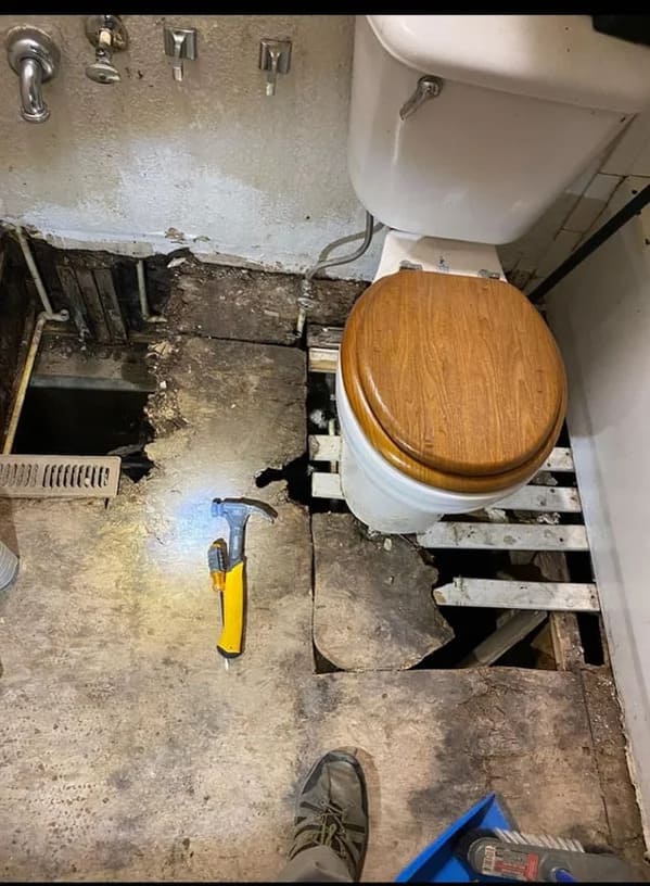 plumbing fails - no floor under toilet
