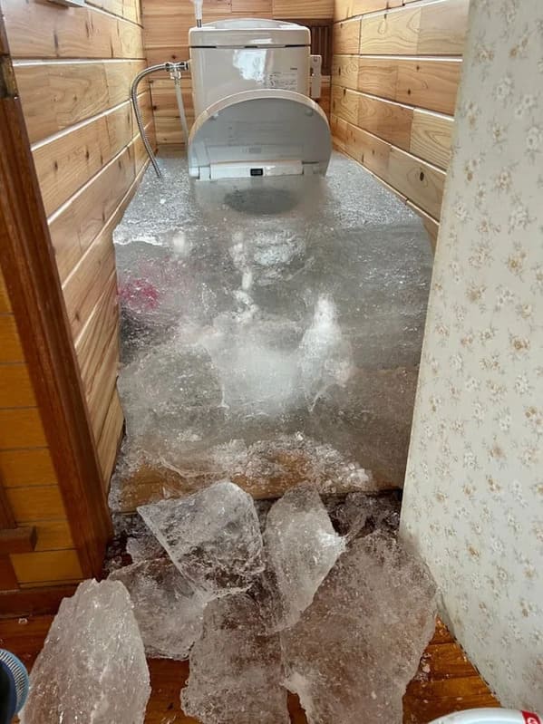 plumbing fails - toilet frozen in ice