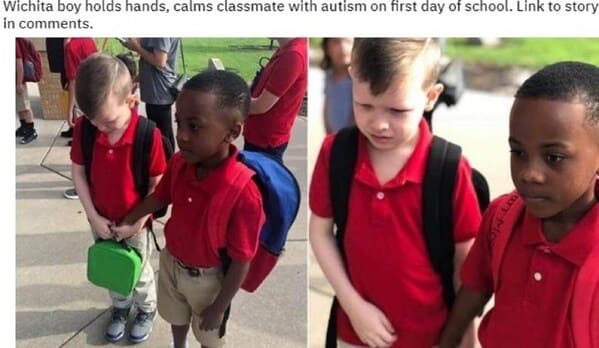 bros helping bros - kid holds hands with classmate with autism at school