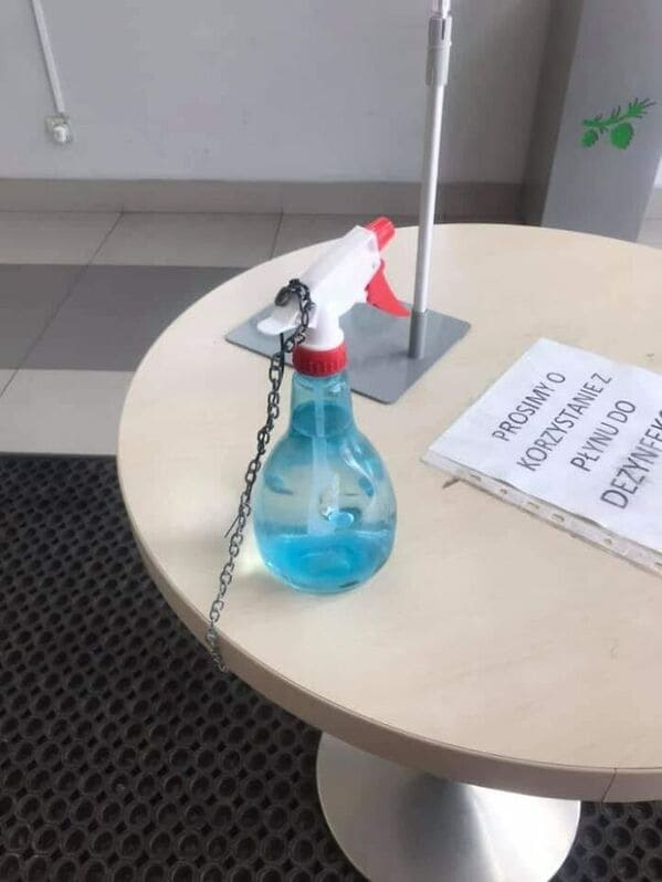 pictures from polish profiles - windex bottle chained to table