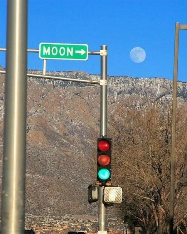 could be album covers - moon street sign pointing at moon
