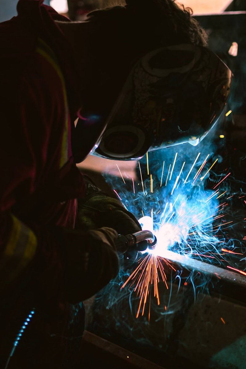 person wearing welding mask photo