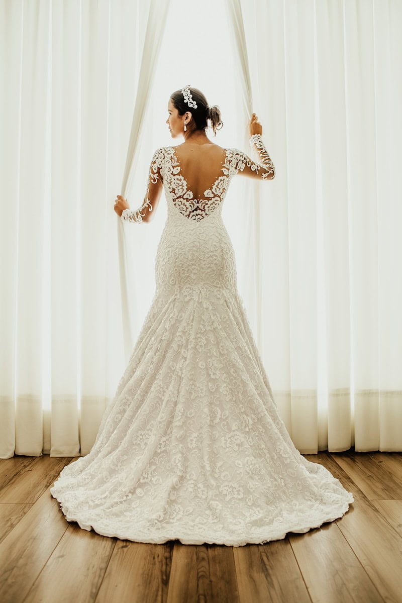 woman in white floral wedding dress