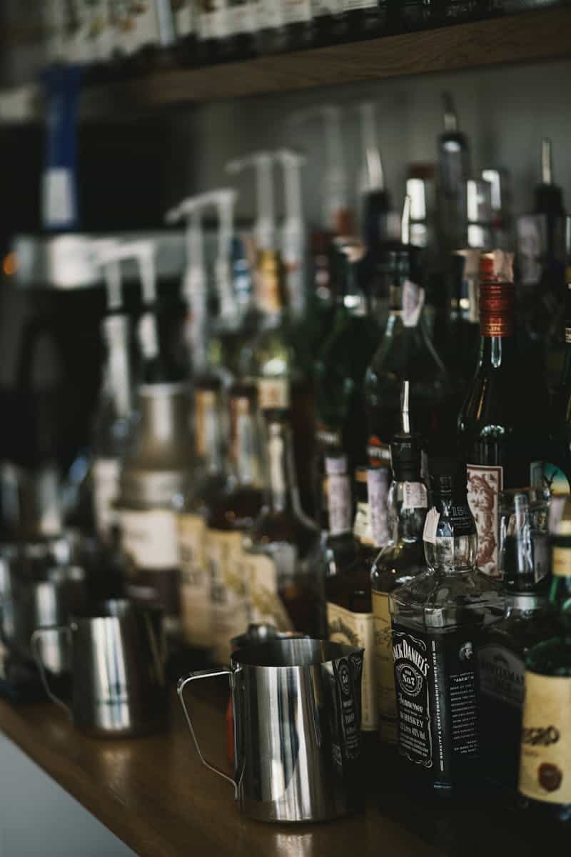 Selective Focus Photography of Assorted-brand Liquor Bottles