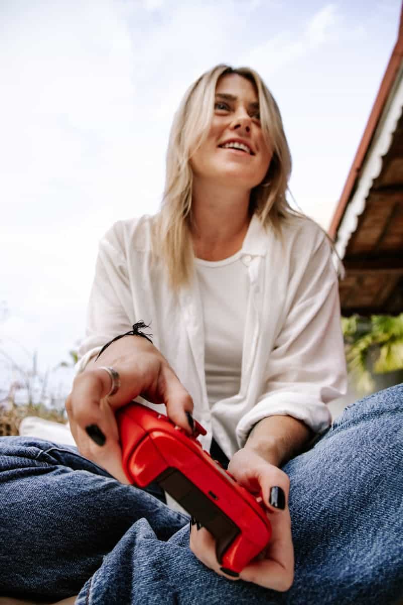 A Woman Playing a Video Game