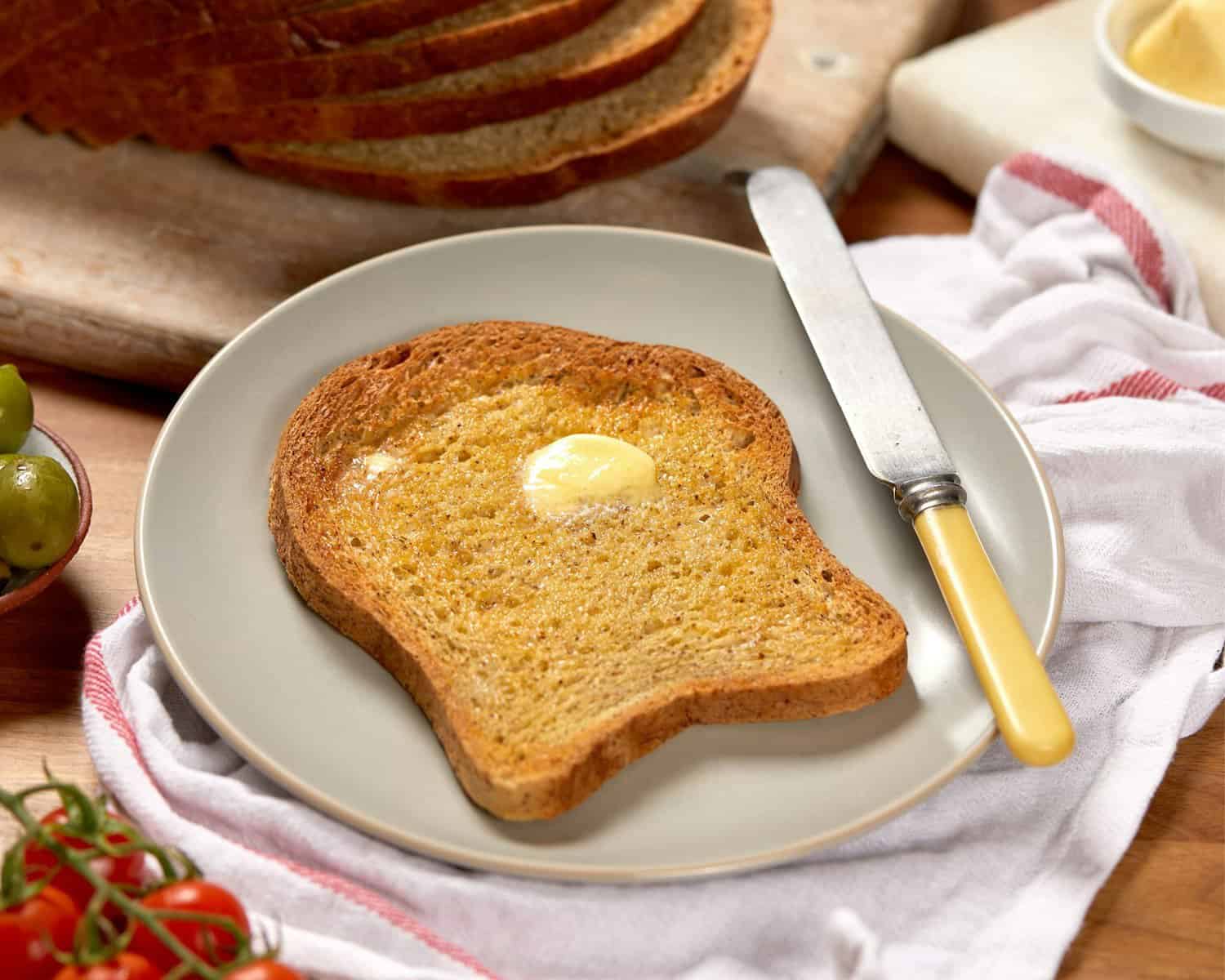 bread on white ceramic plate