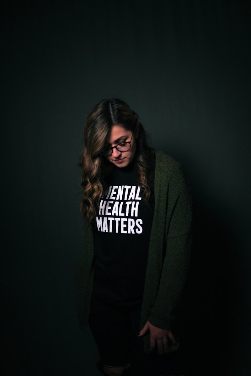 woman in black and white long sleeve shirt