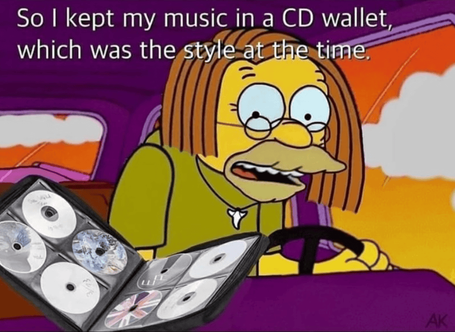Vintage music collection in CD wallet, retro style snapshot.