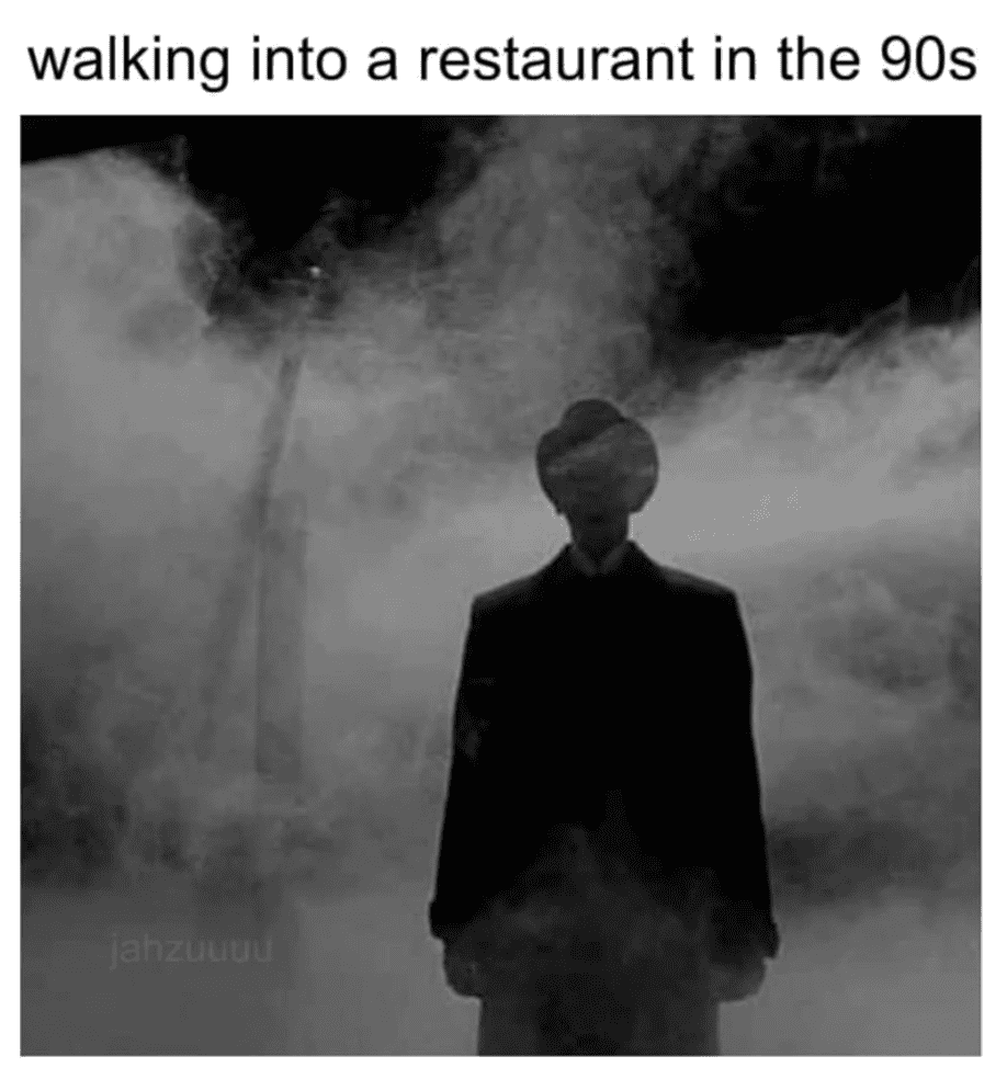 Man walking into a 90s restaurant with foggy atmosphere and nostalgic vibe.
