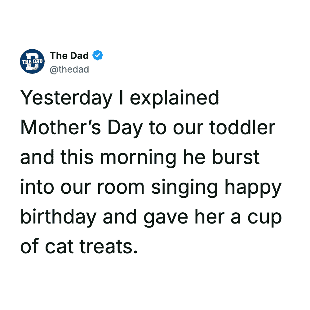 Toddler singing happy birthday to mom with a cup of cat treats in hand.