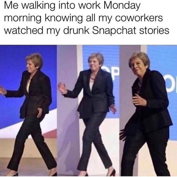 A woman in a suit and heels walking into work monday morning.