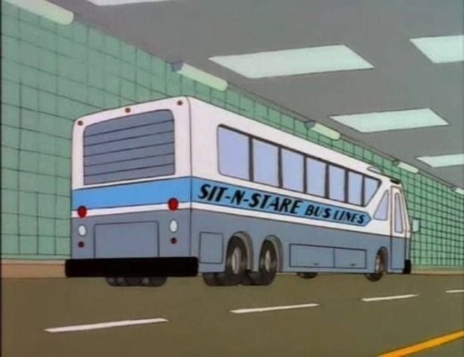 A bus that is driving down the road.