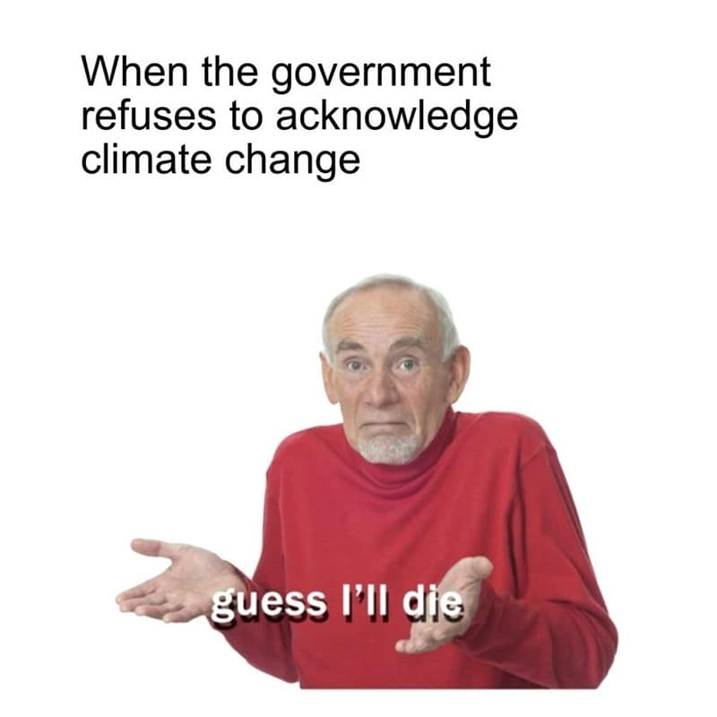 Elderly man with confused expression, shrugging, wearing red sweater, meme about climate change deni.
