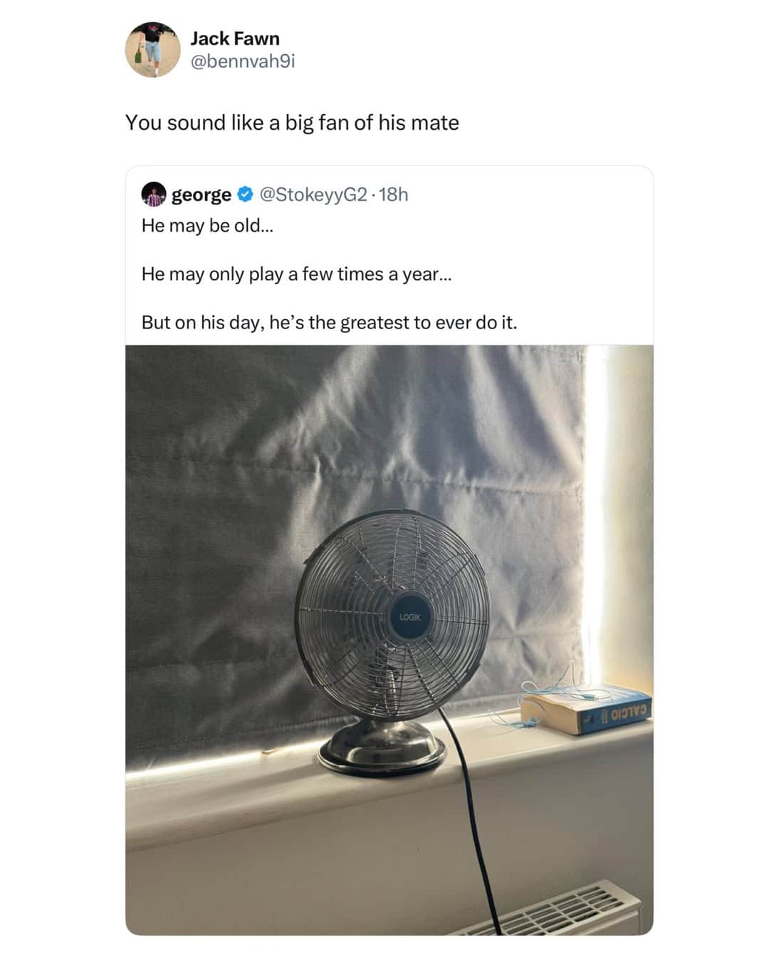 A fan sitting on a windowsill with a box of tissues nearby.