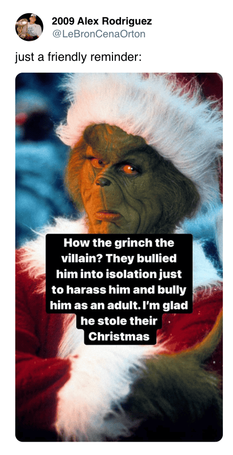 Grinch wearing Santa hat with a humorous Christmas quote overlay.