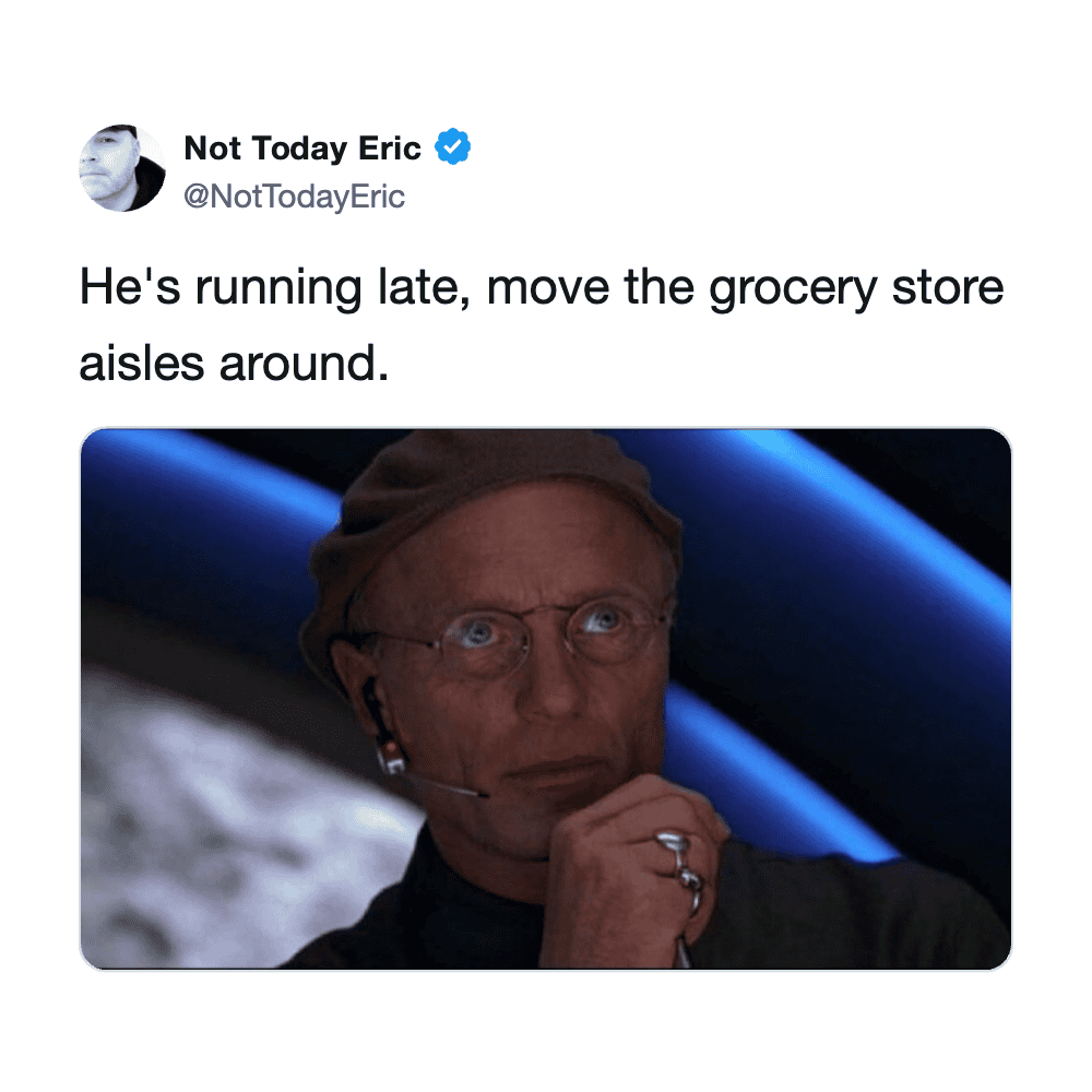 Person looking worried, running late in grocery store aisle.