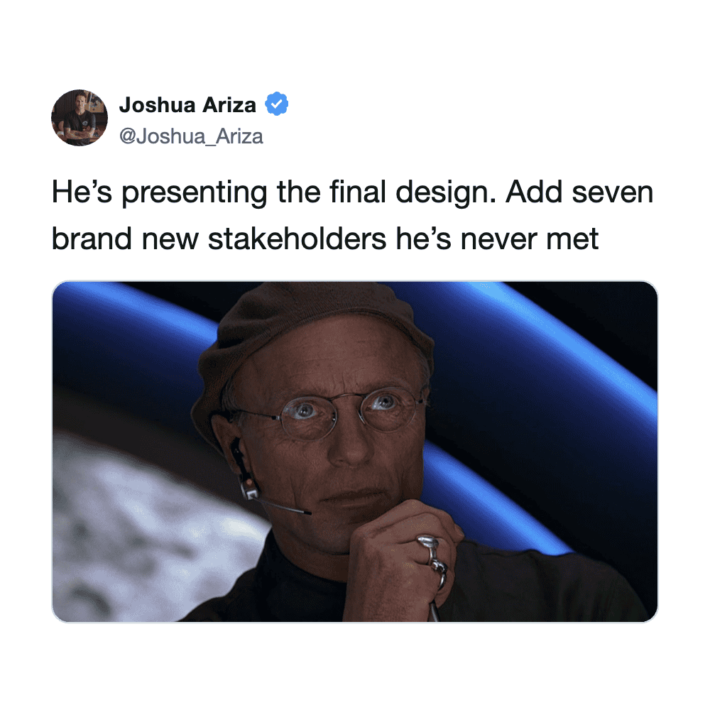 Person presenting final design with seven new stakeholders in a professional setting.