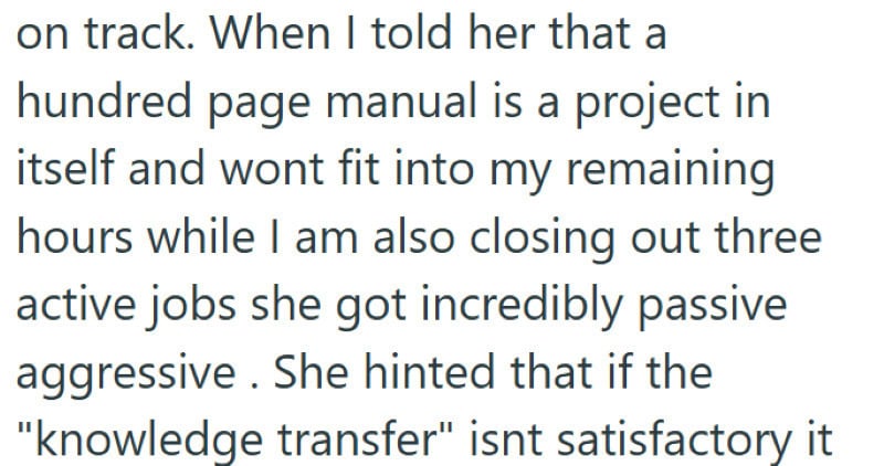 Employee working on a detailed 100-page manual for outsourced staff.