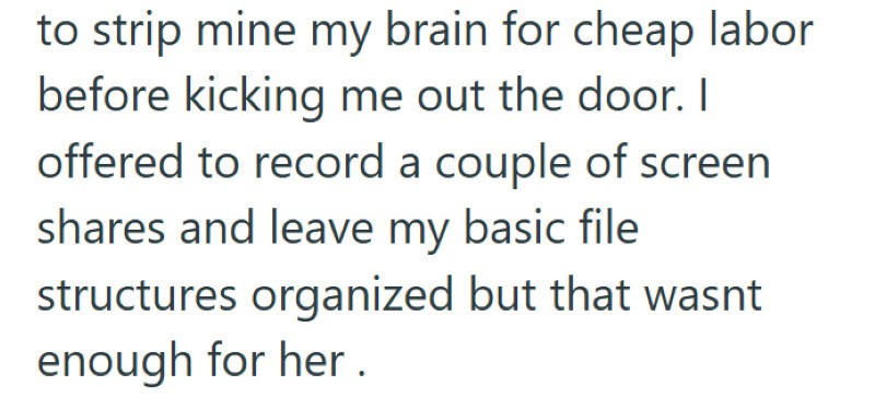 Employee creating a detailed manual for outsourced staff in an office setting.