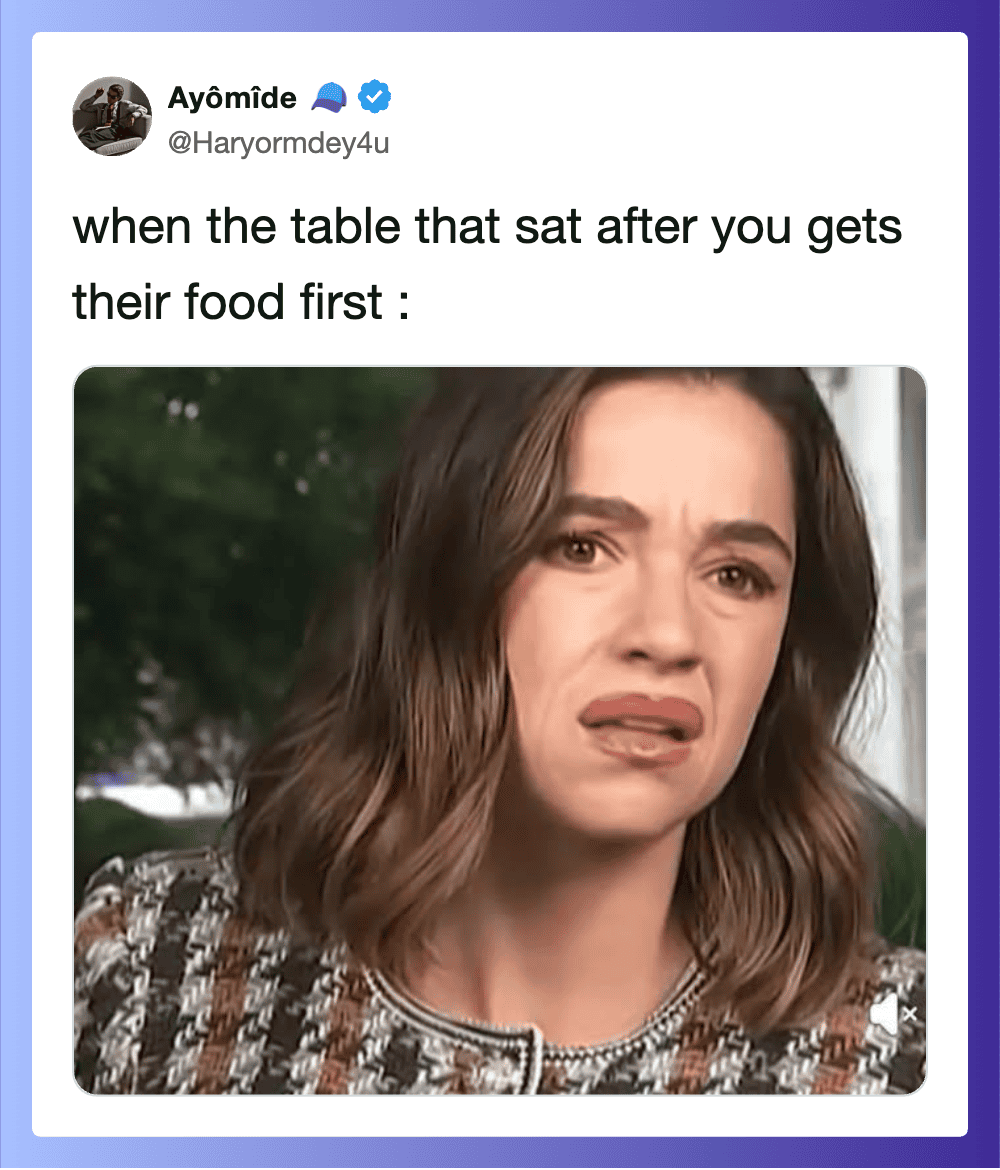"Person making a disgusted face at a table after others got their food first".
