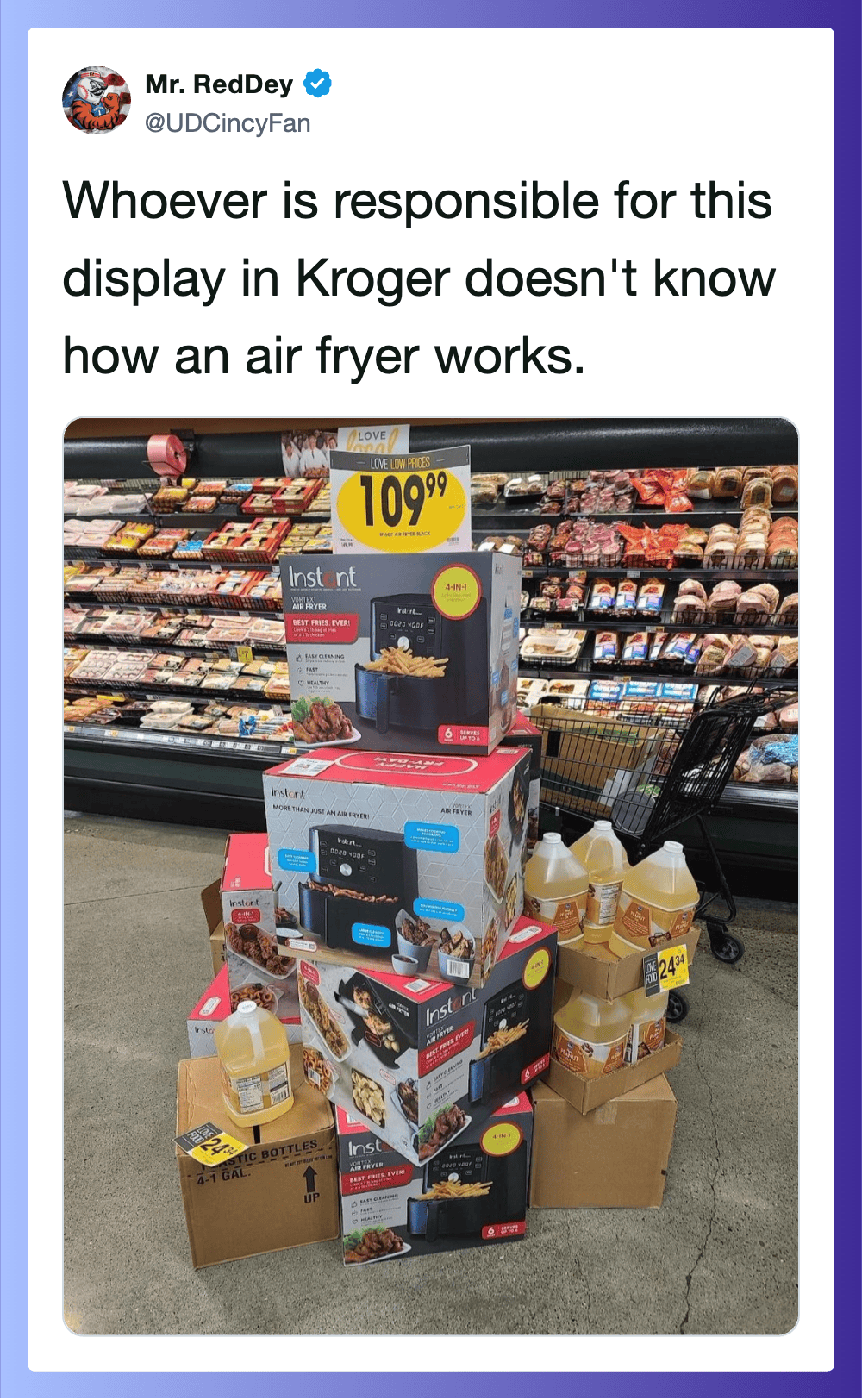 Air fryer display in Kroger with boxes and bottles, person responsible unknown.