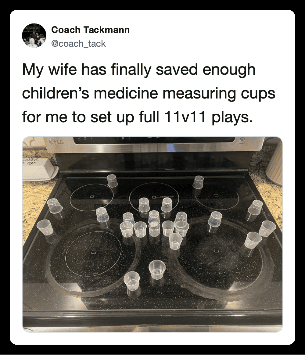 Woman's humorous setup with children's medicine cups on stove.