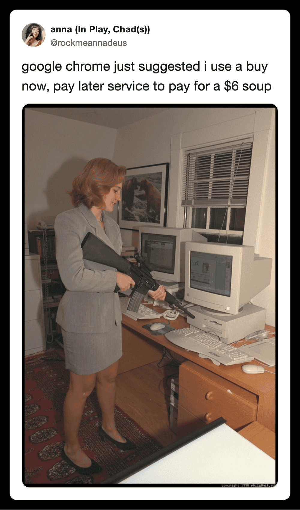 Woman in office pointing gun at computer with Google Chrome meme.