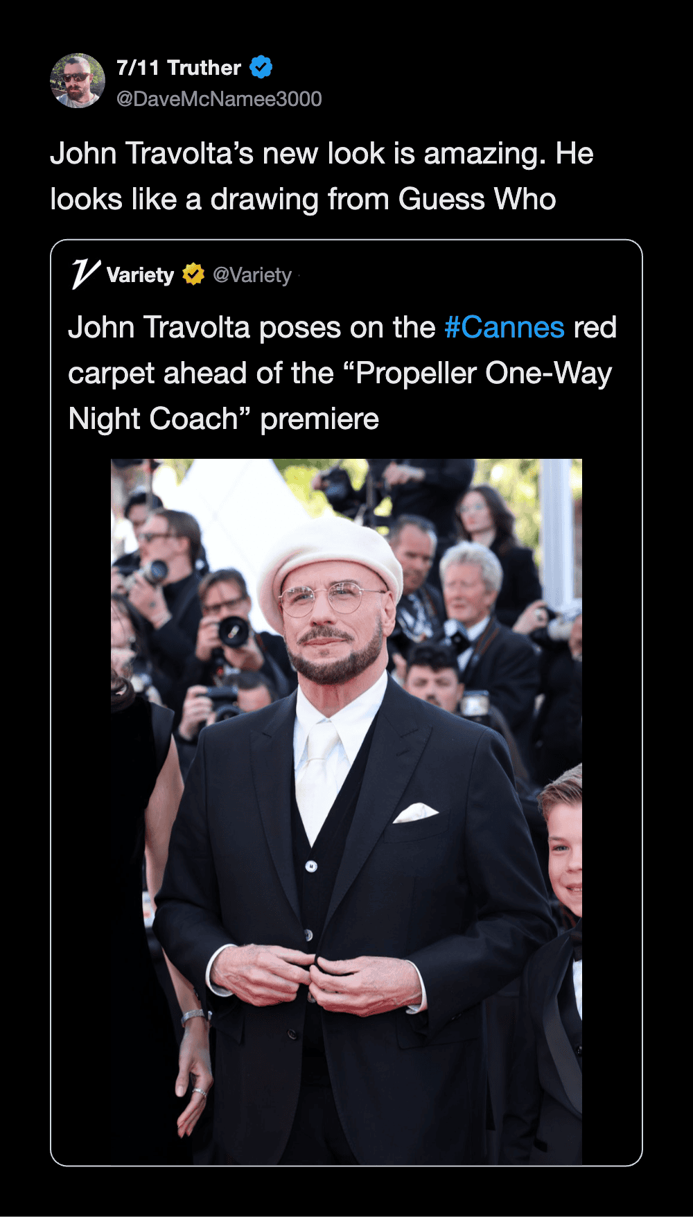 Elegant image of John Travolta in formal attire at Cannes, showcasing his new look and charismatic p.