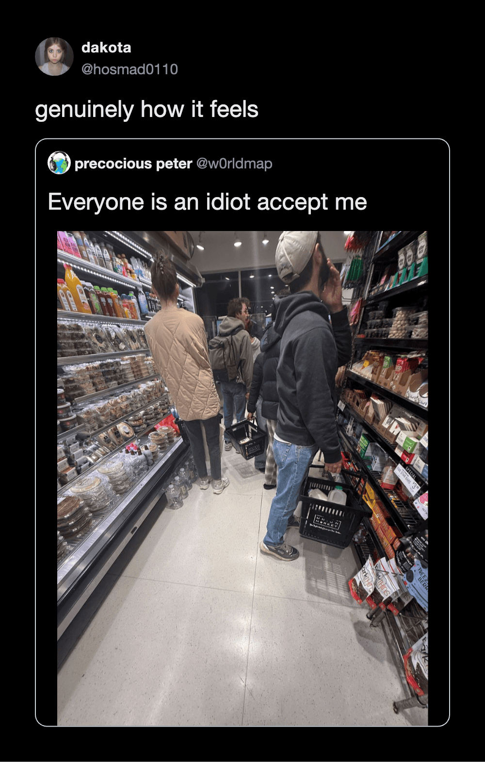 People shopping in a grocery store aisle with various products on shelves.