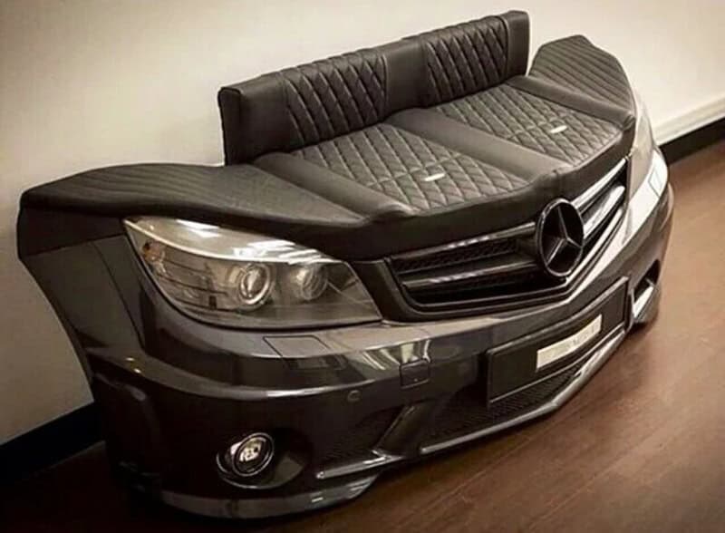 Custom car seat cover designed to look like a car dashboard and steering wheel, adding a unique touc.