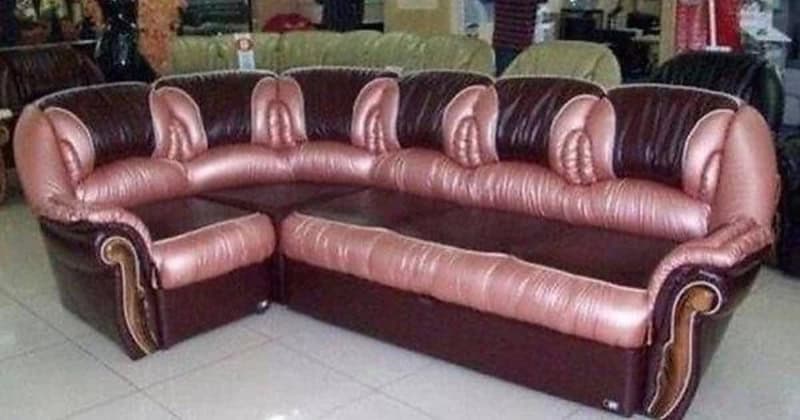Stylish L-shaped sofa with pink and brown leather upholstery, perfect for modern living rooms.
